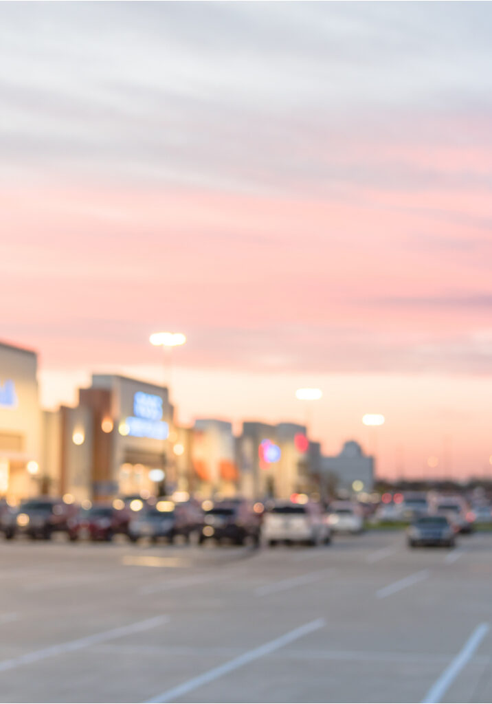 Blurred Stylized Photo Of A Shopping Mall Parking Lot